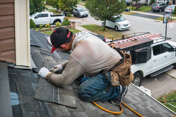 Professional Roof Replacement technician working in Durand, WI
